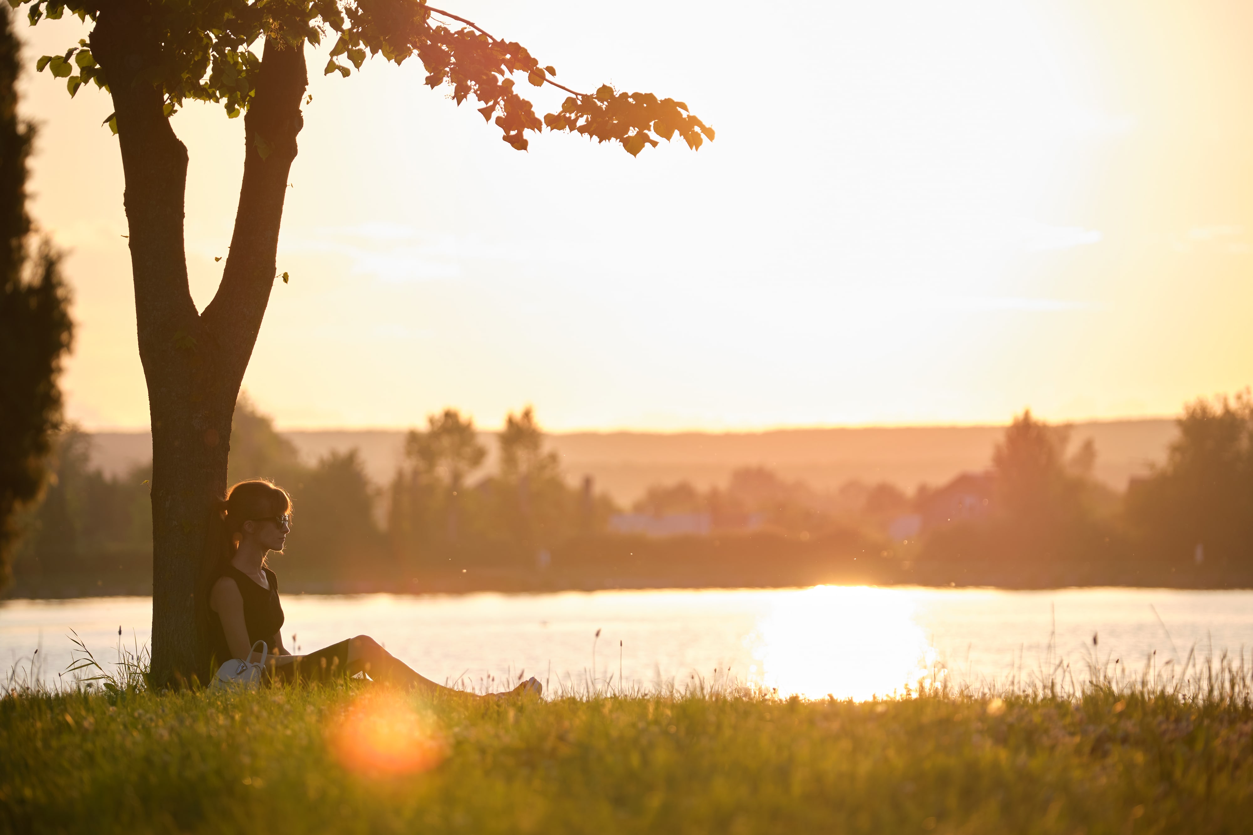 Person enjoying a peaceful sunrise